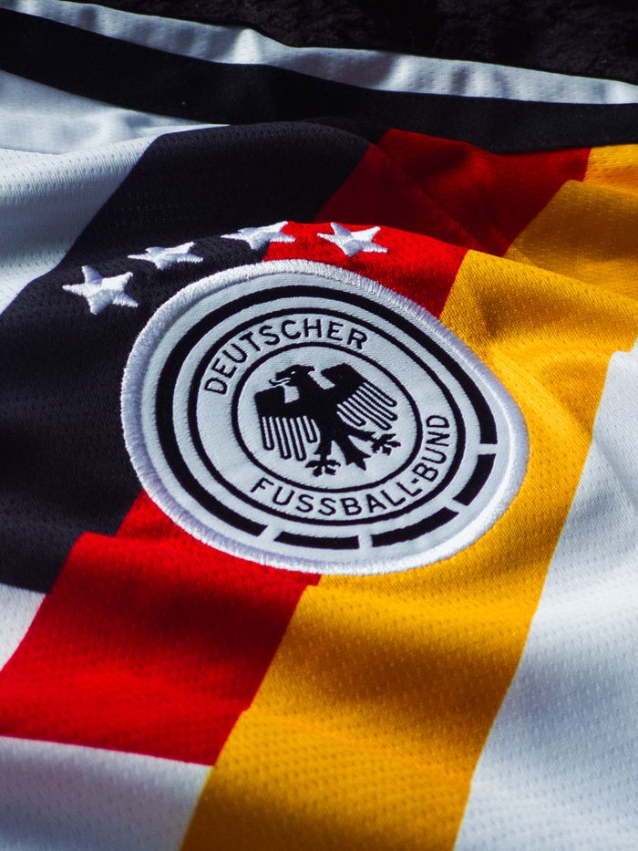 German soccer jersey featuring the Deutscher Fußball-Bund emblem with national colors.
